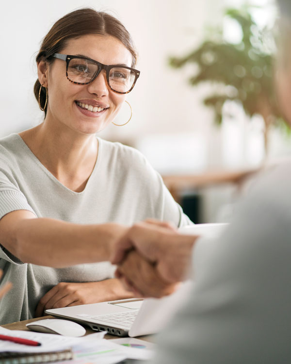 shaking hands with client